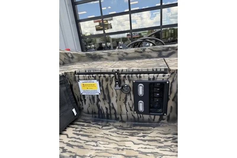 Slide: The Image of Control panel of 2027 Excel 1751 Viper F4 boat with camouflage design. - 13