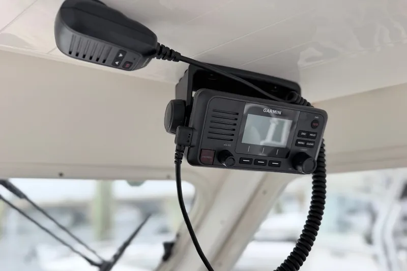Slide: The Image of Garmin radio installed in 2023 NorthCoast 285 Cabin boat interior. - 16