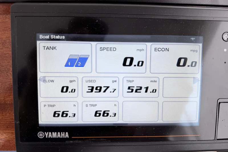 Slide: The Image of Yamaha boat status display on 2023 NorthCoast 285 Cabin, showing fuel and trip data. - 13