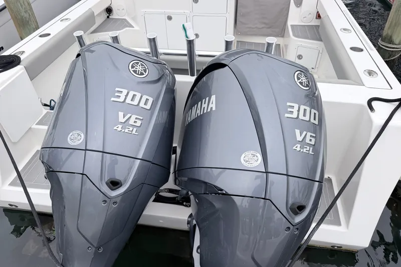 Slide: The Image of Twin Yamaha 300 V6 outboard engines on a 2023 NorthCoast 285 Cabin boat. - 19