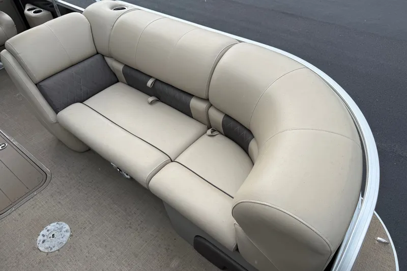 Slide: The Image of 2023 Sun Tracker Party Barge 22 XP3 beige seating with gray accents on a pontoon boat. - 14