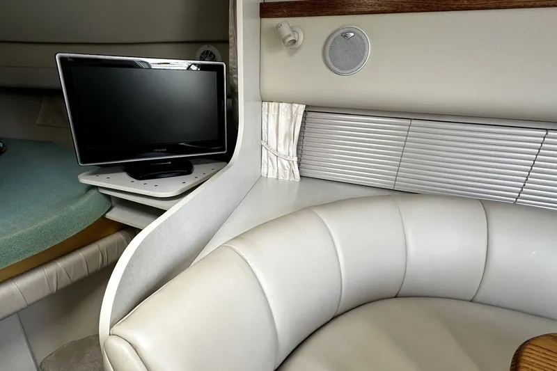 Slide: The Image of Interior of 1997 Cruisers Yachts 337 Esprit with TV and leather seating. - 24