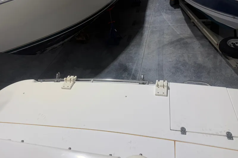 Slide: The Image of 1997 Cruisers Yachts 337 Esprit boat in storage, showing deck and surrounding area. - 31