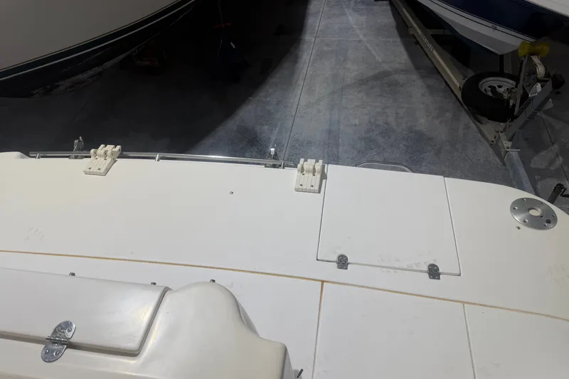 Slide: The Image of 1997 Cruisers Yachts 337 Esprit boat deck in storage, showing clean surface and fittings. - 33