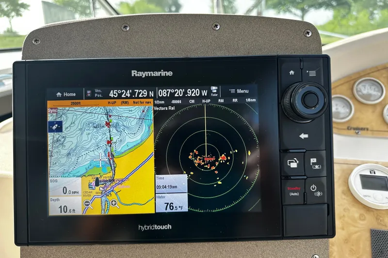 Slide: The Image of Raymarine navigation display on 1997 Cruisers Yachts 337 Esprit, showing map and radar data. - 5