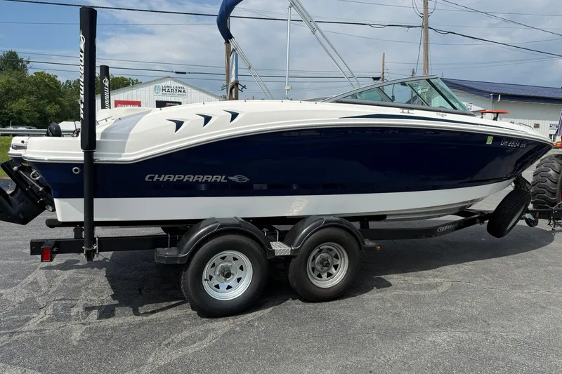 Slide: The Image of 2014 Chaparral 21 H2O Sport boat on trailer at marina, side view. - 5