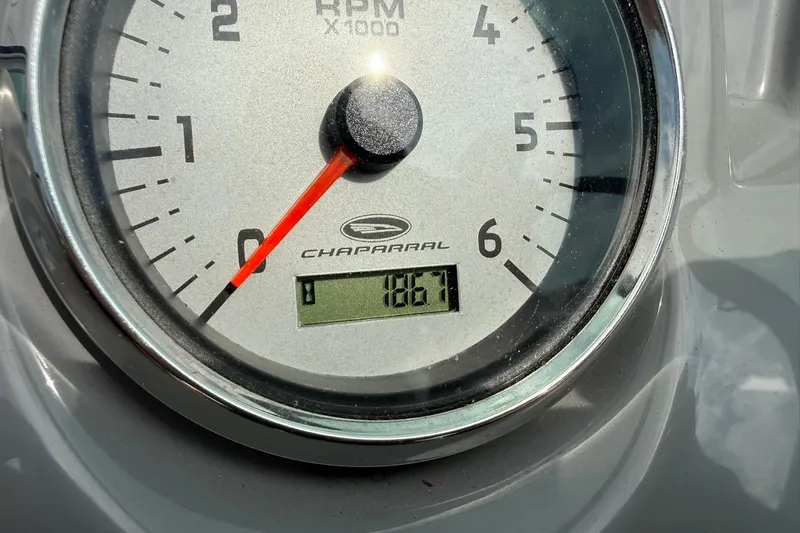 Slide: The Image of Close-up of a 2014 Chaparral 21 H2O Sport tachometer displaying 186.7 RPM. - 17