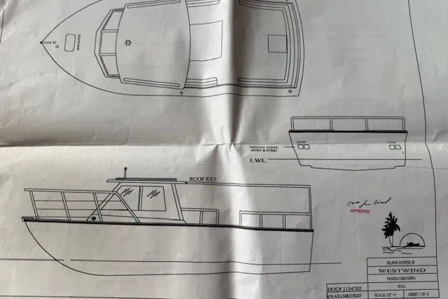 Slide: The Image of Blueprint of 2002 Island Hopper Forward Cabin boat design, showing top and side views. - 19