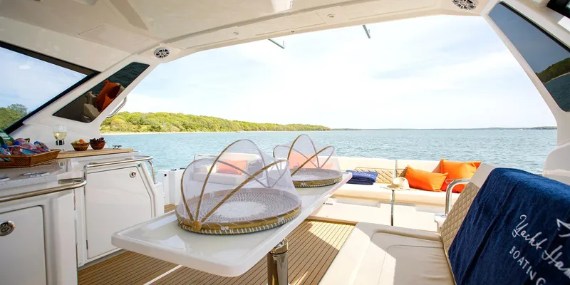 Slide: The Image of Luxurious 2021 Aquila 36 Sport yacht interior with scenic ocean view. - 26