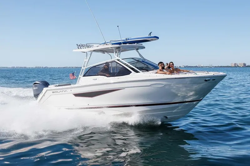 The Image of Manufacturer Provided Image: 2026 Solara S-250 DC boat cruising on open water with passengers enjoying the ride. - 1