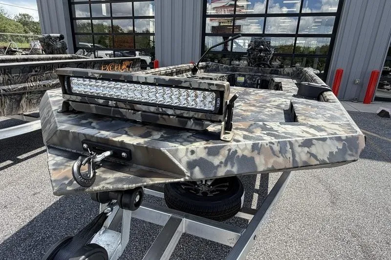 Slide: The Image of 2027 Excel 1754 Shallow Water F4 boat with camouflage design and LED light bar. - 20