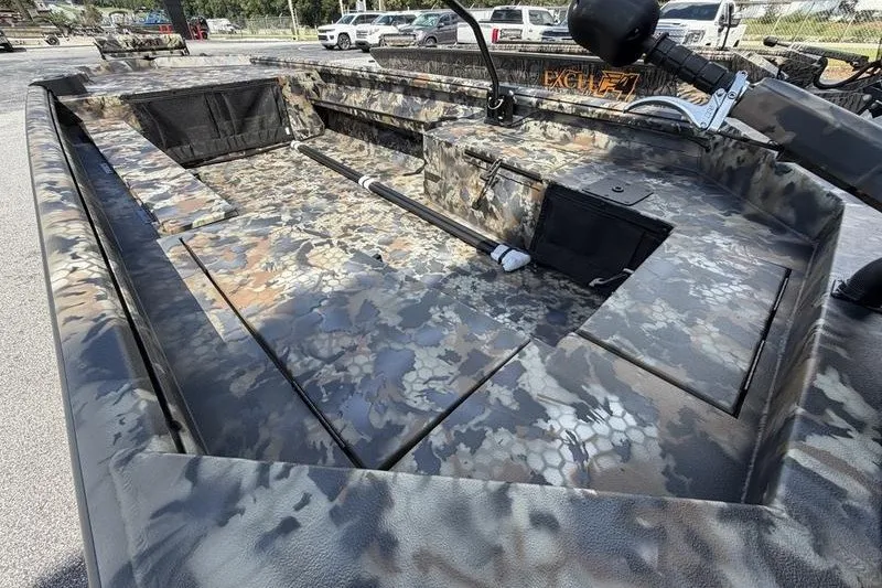 Slide: The Image of 2027 Excel 1754 Shallow Water F4 boat with camouflage interior design. - 2