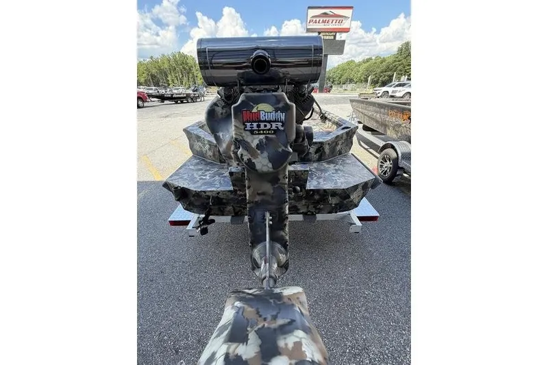 Slide: The Image of 2027 Excel 1754 Shallow Water F4 boat with camo design and Mud Buddy HDR motor. - 13