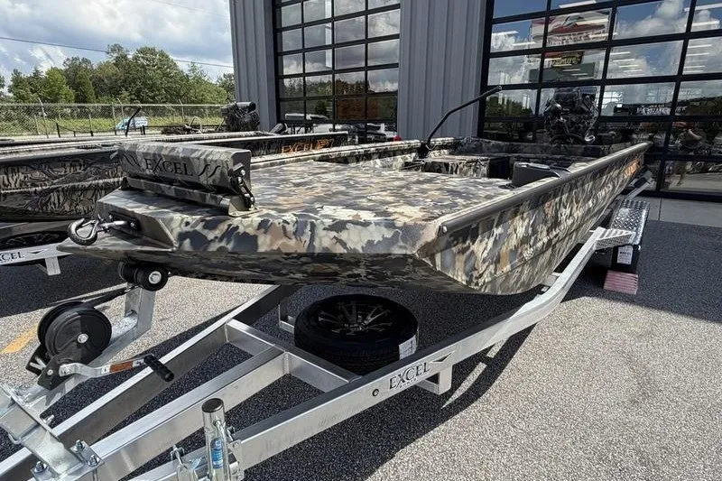 The Image of 2027 Excel 1754 Shallow Water F4 boat on trailer, camo design, outdoor setting. - 0
