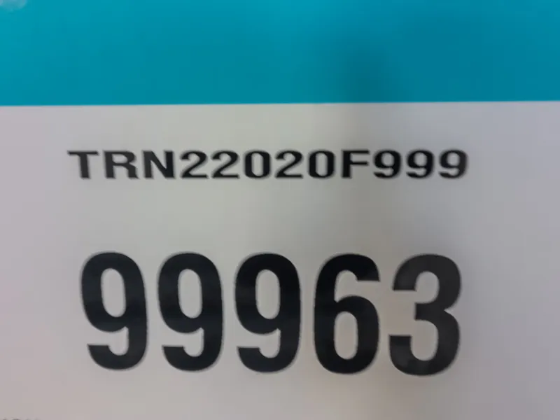 Slide: The Image of License plate displaying TRN22020F999 and 99963. - 26
