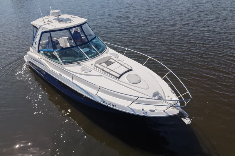 Slide: The Image of 2021 Monterey 335 Sport Yacht cruising on calm waters. - 13
