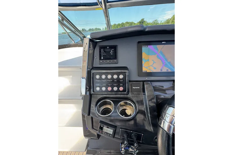 Slide: The Image of Dashboard of 2021 Monterey 335 Sport Yacht with navigation and control panels. - 47