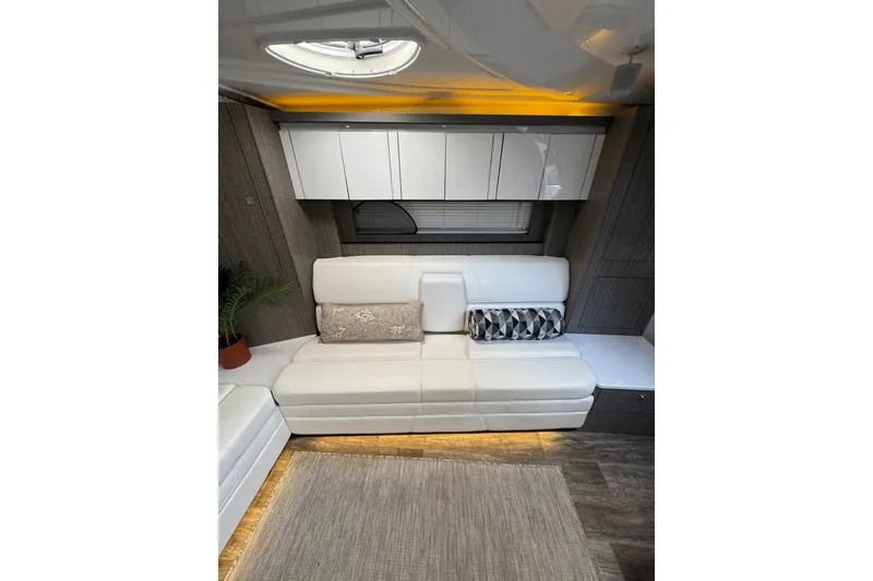 Slide: The Image of Luxurious interior of 2021 Monterey 335 Sport Yacht with white leather seating and modern decor. - 30