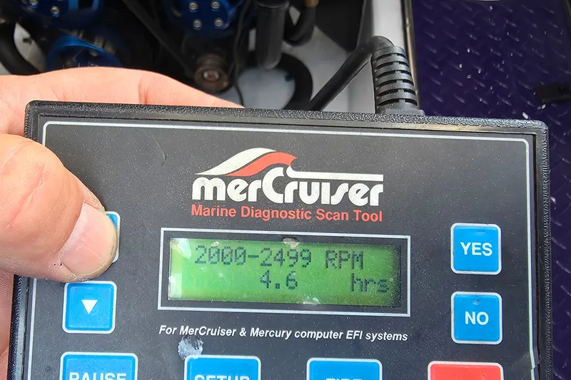 Slide: The Image of MerCruiser diagnostic tool displaying engine RPM hours for 2006 Donzi 38 ZR boat. - 17