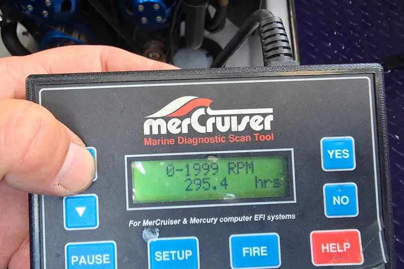 Slide: The Image of MerCruiser diagnostic tool displaying 295.4 hours for 2006 Donzi 38 ZR boat engine. - 19