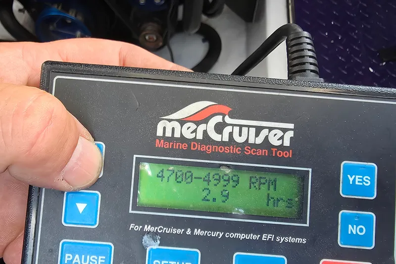 Slide: The Image of MerCruiser diagnostic tool displaying RPM data for 2006 Donzi 38 ZR boat engine. - 24