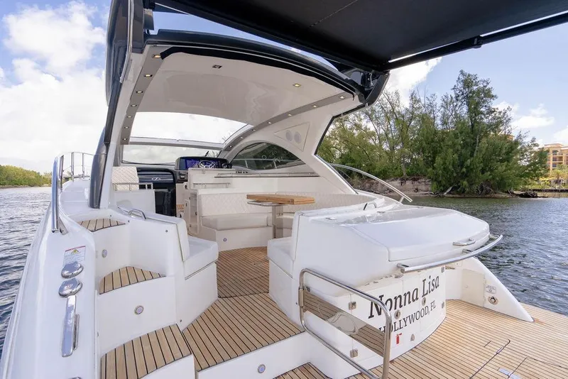 Slide: The Image of Luxurious 2022 Schaefer 400 Sport yacht with spacious deck and elegant seating area. - 30