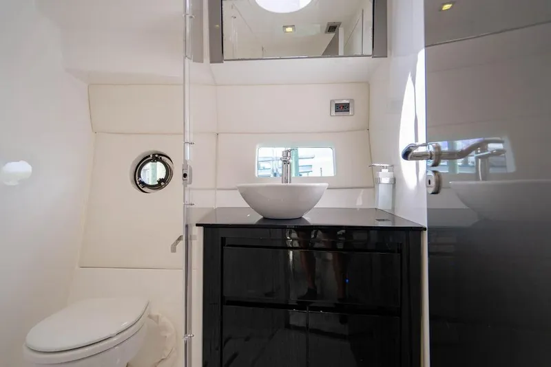 Slide: The Image of Luxurious bathroom interior of 2022 Schaefer 400 Sport yacht with modern fixtures. - 66