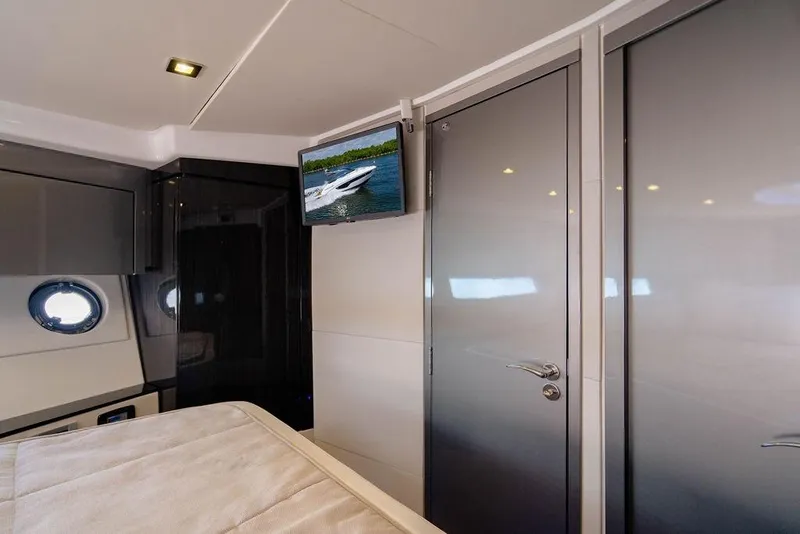 Slide: The Image of Interior of 2022 Schaefer 400 Sport yacht cabin with TV and modern design. - 65
