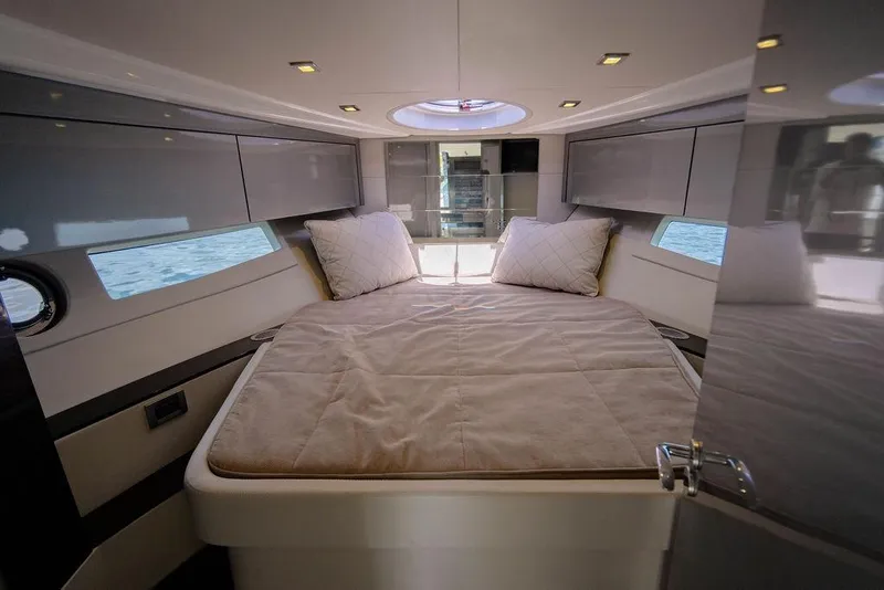 Slide: The Image of Luxurious cabin interior of 2022 Schaefer 400 Sport yacht with cozy bedding. - 64