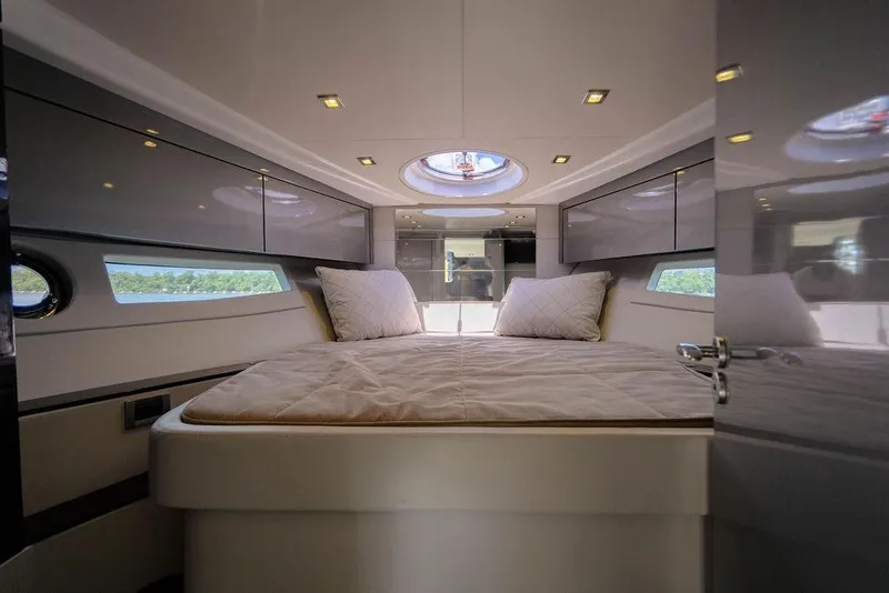 Slide: The Image of Luxurious cabin interior of 2022 Schaefer 400 Sport yacht with modern design and cozy bedding. - 59