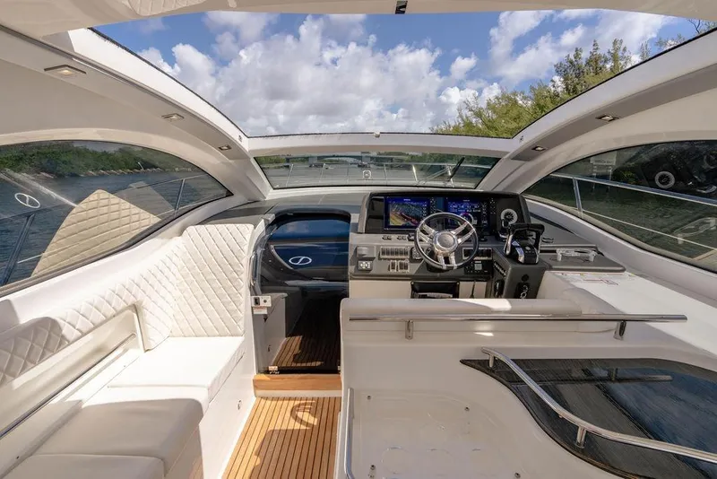 Slide: The Image of Interior of 2022 Schaefer 400 Sport yacht with modern helm and luxurious seating. - 36
