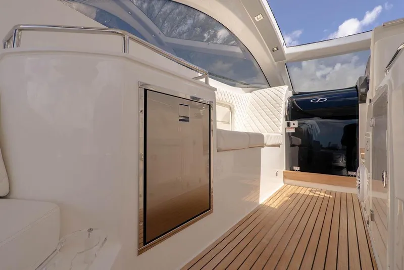 Slide: The Image of Luxurious interior of 2022 Schaefer 400 Sport yacht with sleek design and wooden flooring. - 35