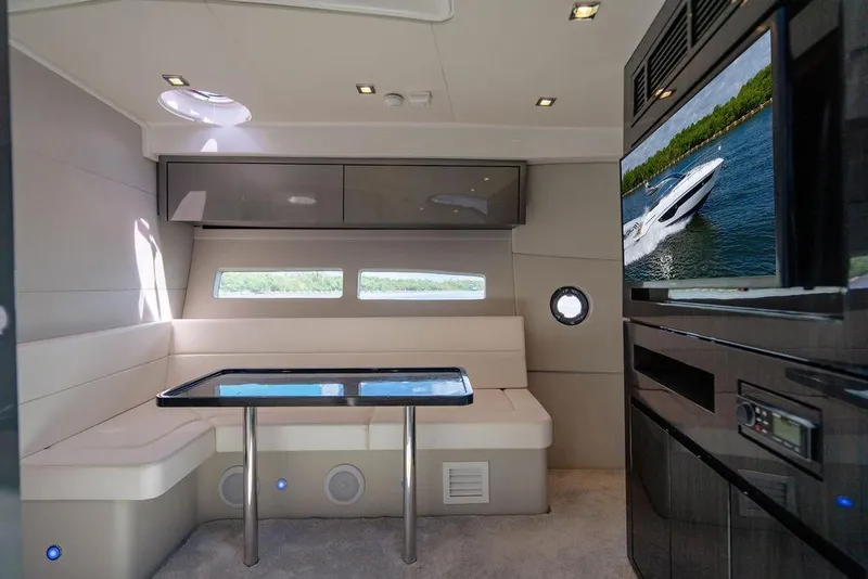 Slide: The Image of Luxurious interior of 2022 Schaefer 400 Sport yacht with modern seating and entertainment system. - 57