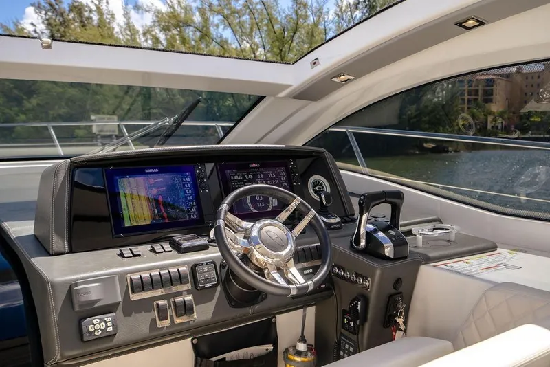 Slide: The Image of Interior cockpit of 2022 Schaefer 400 Sport yacht with modern navigation controls. - 39