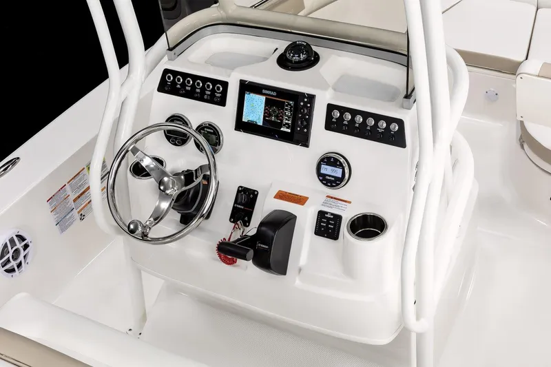 Slide: The Image of Manufacturer Provided Image: 2025 Robalo 206 Cayman boat console with steering wheel and navigation controls. - 5