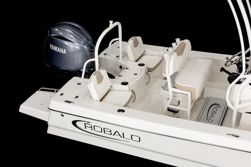Slide: The Image of Manufacturer Provided Image: 2025 Robalo 206 Cayman boat with Yamaha engine, featuring sleek white seating and design. - 7