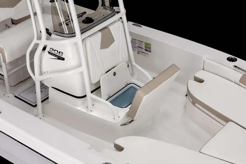 Slide: The Image of Manufacturer Provided Image: 2025 Robalo 206 Cayman boat interior with seating and storage compartments. - 4