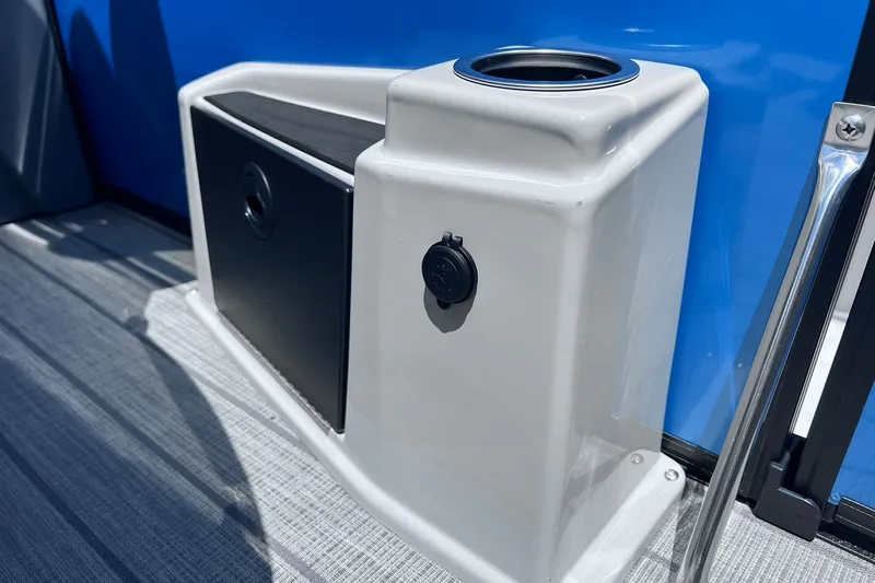 Slide: The Image of 2024 Starcraft SLS 3 boat detail with cup holder and storage compartment. - 34
