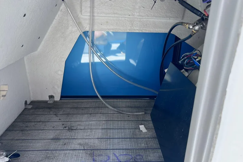 Slide: The Image of Interior view of 2024 Starcraft SLS 3 boat, showcasing wiring and components. - 31