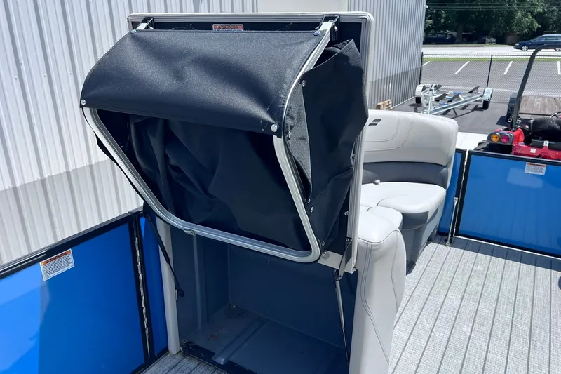 Slide: The Image of 2024 Starcraft SLS 3 boat interior with seating and storage compartment. - 29