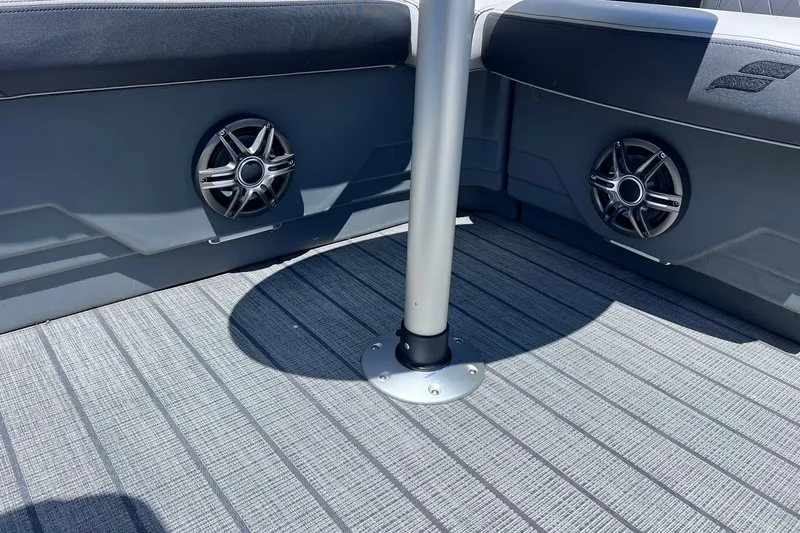 Slide: The Image of 2024 Starcraft SLS 3 boat interior with speakers and textured flooring. - 26
