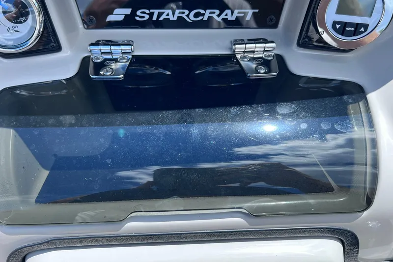 Slide: The Image of 2024 Starcraft SLS 3 dashboard with gauges and reflective glass cover. - 24