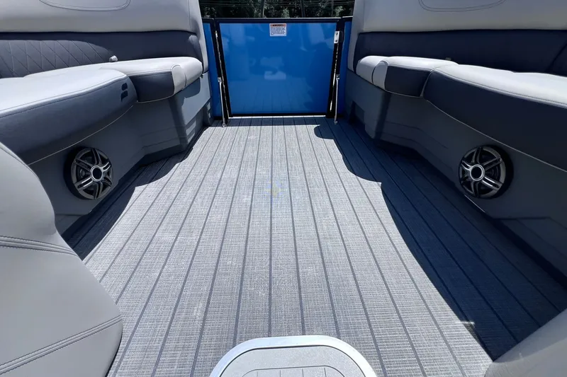 Slide: The Image of 2024 Starcraft SLS 3 boat interior with gray seating and marine speakers. - 27