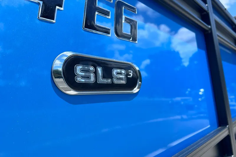 Slide: The Image of 2024 Starcraft SLS 3 emblem on a glossy blue surface. - 40