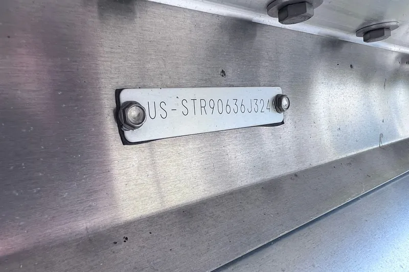 Slide: The Image of Metal identification plate on 2024 Starcraft SLS 3 boat hull. - 42