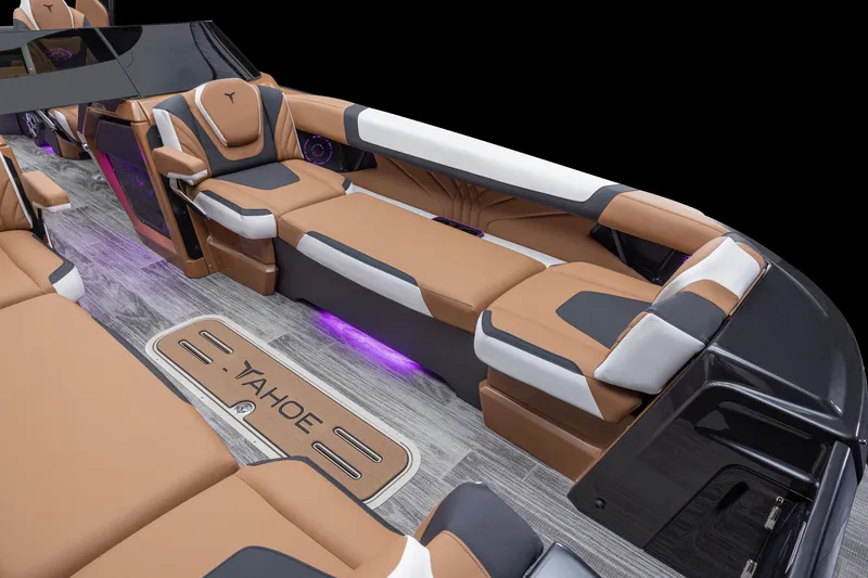 Slide: The Image of Luxurious interior of 2026 Tahoe Pontoon Grand Tahoe Elite Windshield 25 with plush seating. - 18