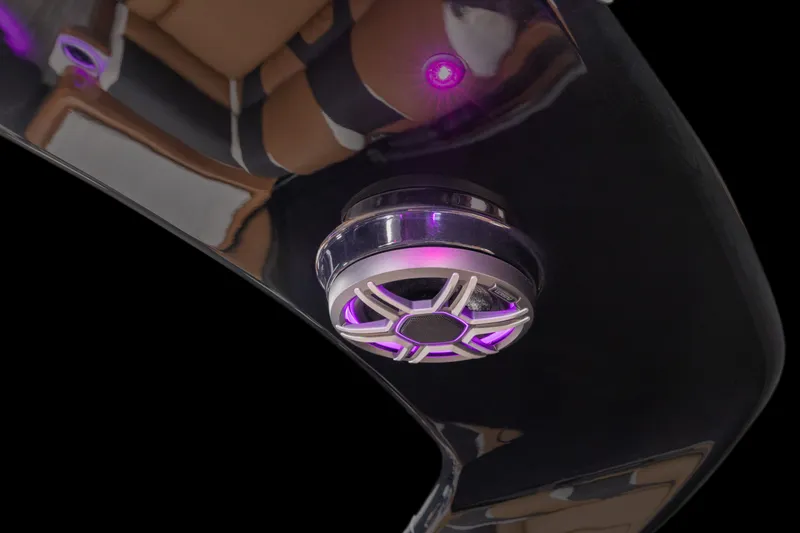 Slide: The Image of 2026 Tahoe Pontoon Grand Tahoe Elite Windshield 25 with illuminated speaker detail. - 20
