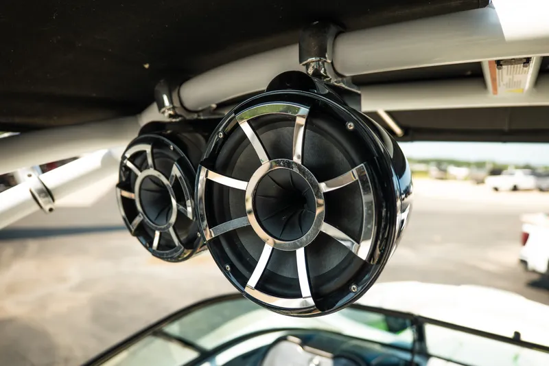 Slide: The Image of Close-up of speakers on a 2015 Moomba Mojo boat, highlighting audio equipment. - 21