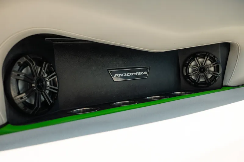 Slide: The Image of Interior speakers and logo of a 2015 Moomba Mojo boat. - 37