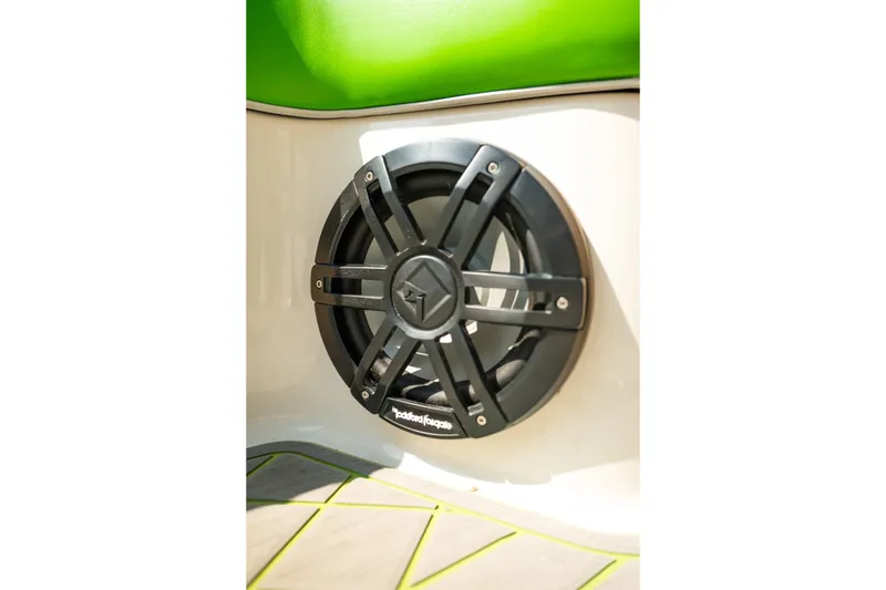 Slide: The Image of 2015 Moomba Mojo boat speaker with green upholstery and Rockford Fosgate branding. - 41